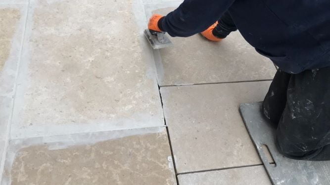 Grouting with an exterior tile grout