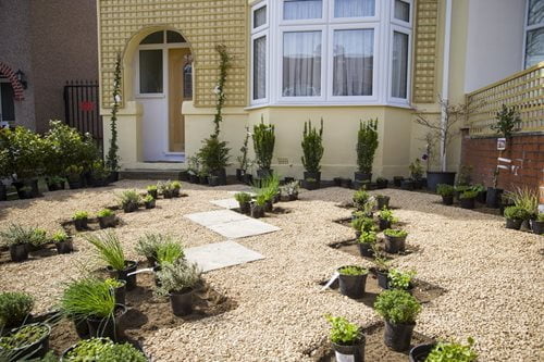Making a driveway into a garden Driveway with gravel, paving and planting
