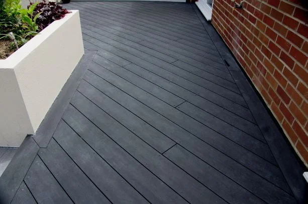 Charcoal composite decking on the diagonal Charcoal composite decking on the diagonal