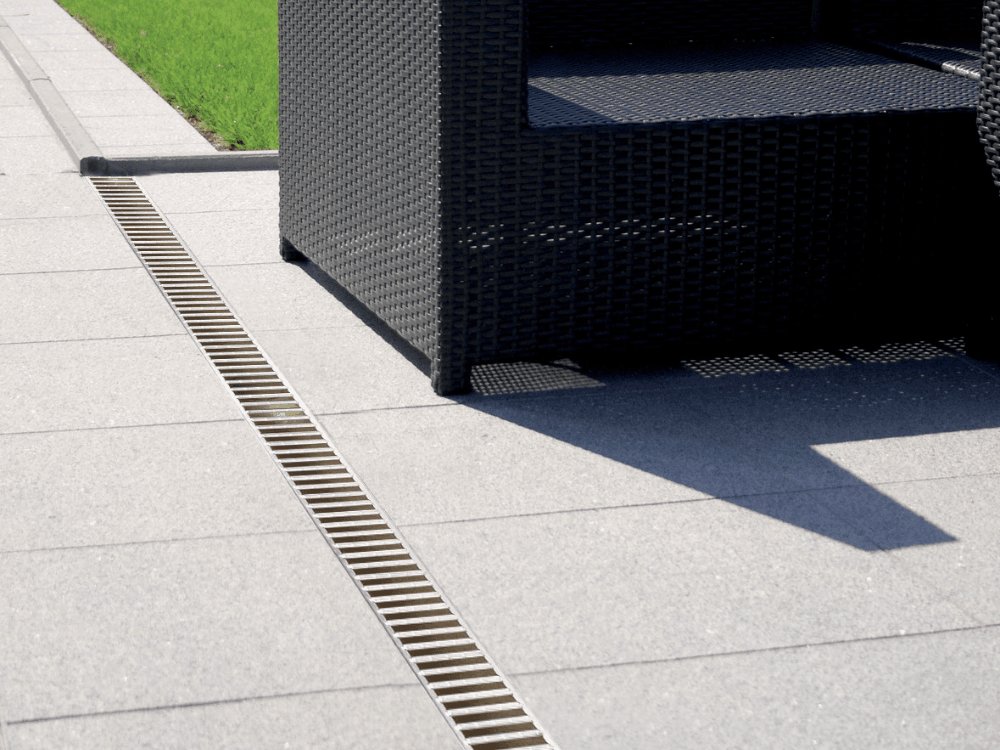 Proper garden drainage provides numerous advantages, ensuring a healthy and functional outdoor space. We explain the options and top questions to ask your landscaper.