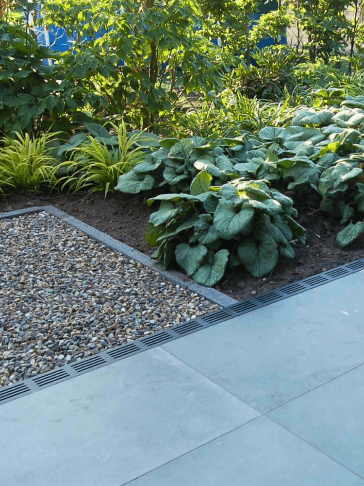Proper garden drainage provides numerous advantages, ensuring a healthy and functional outdoor space. We explain the options and top questions to ask your landscaper.