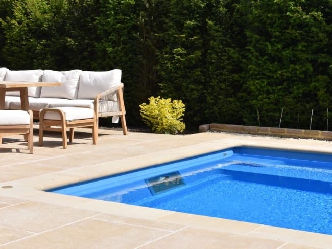 Limestone patio with pool